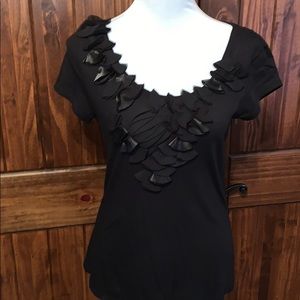 Elle- small black top w/pretty detail around scoop
